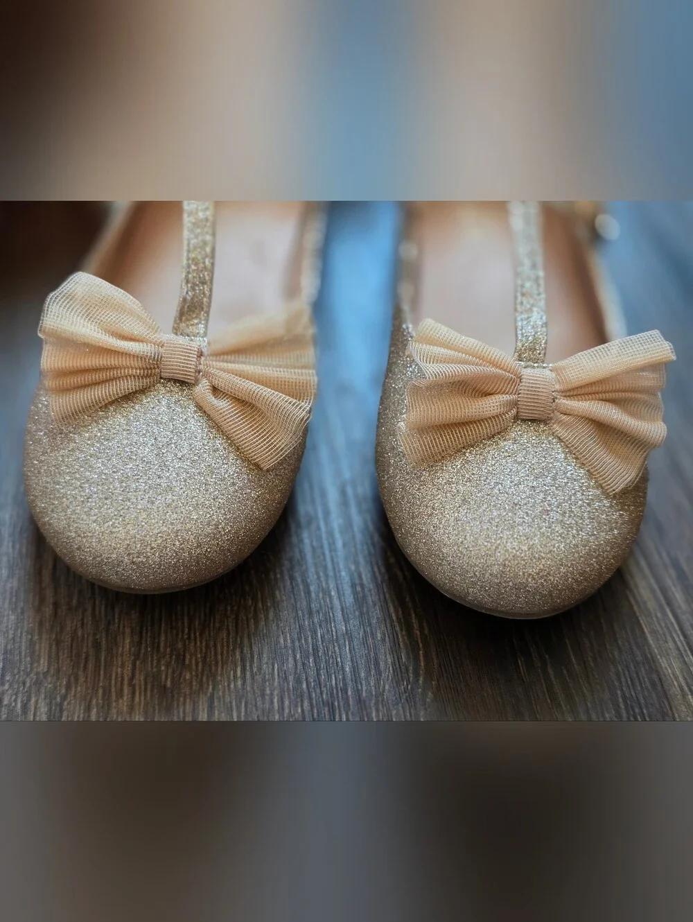 Cupcake Couture gold shimmer bow t-strap flats